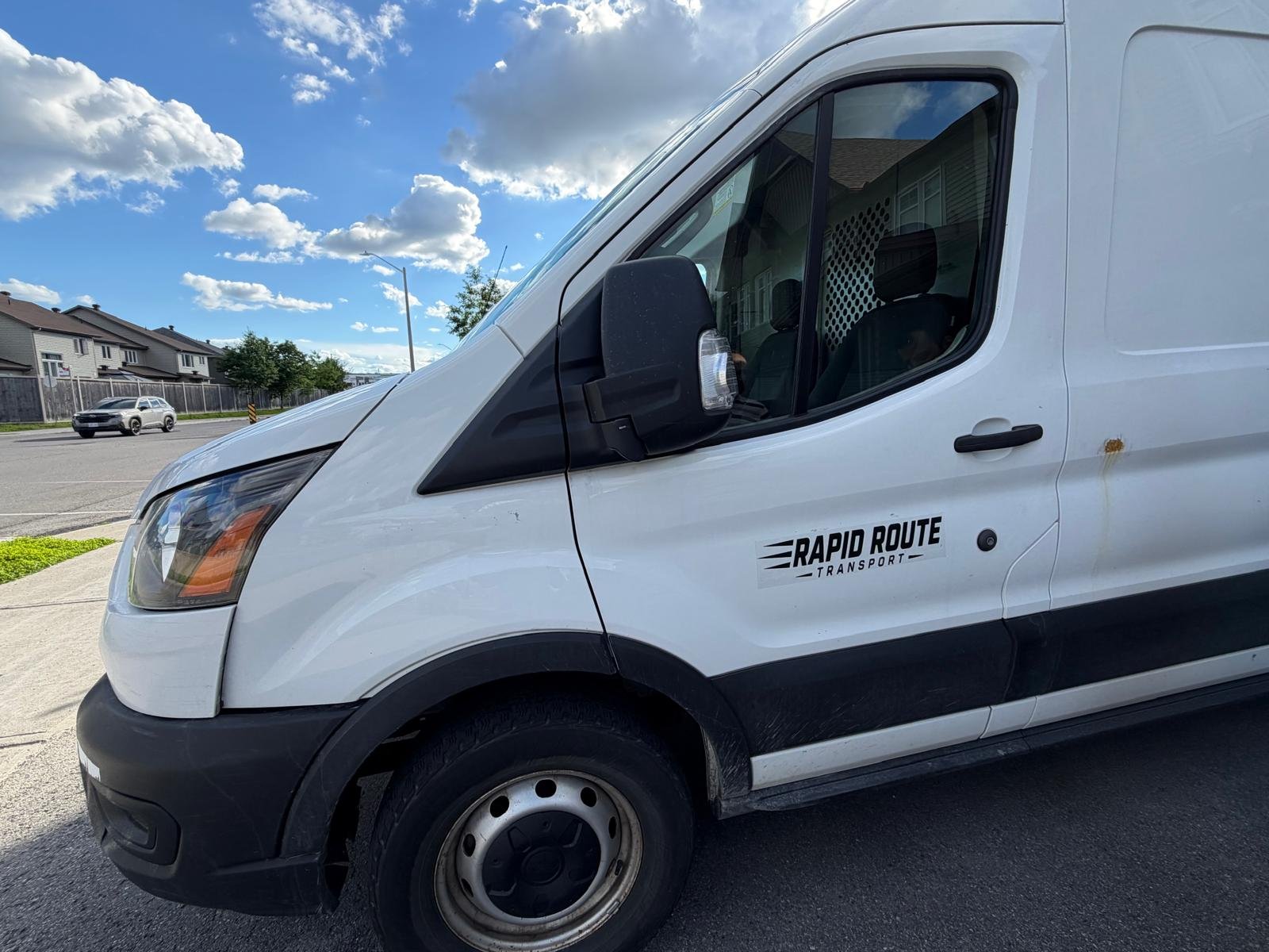 Rapid Route Transport branded delivery van